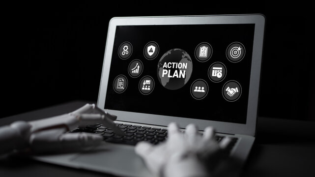 A futuristic laptop displays a detailed action plan graphic while robotic hands indicate a blend of technology and strategy for modern business solutions. Ideal for tech and business themes. Ledger
