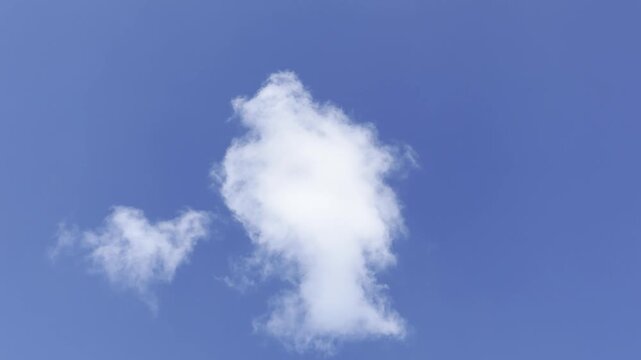 Cumulus generally refers to the puffy, white, cotton-like clouds with flat bases and rounded tops often seen on sunny days. in Waikiki, Honolulu, Oahu, Hawaii.