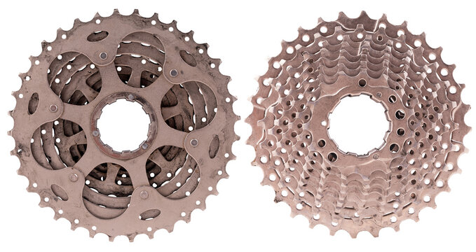 A metal bicycle freewheel gear shown from both sides on an isolated background.
