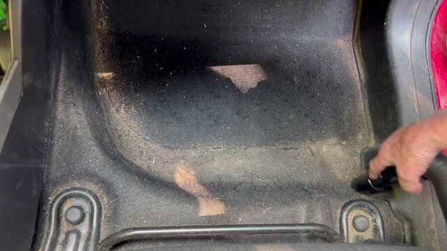 Vacuuming dirty car interior