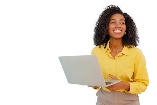 Happy young african american woman holding laptop working studying online with successful business vision