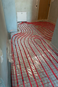 Underfloor surface heating pipes. Low temperature heating concept