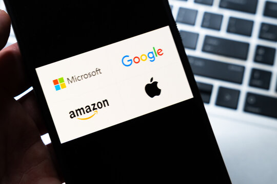 Warsaw, Poland - July 26, 2026: Smartphone screen displaying logos of Microsoft, Google, Amazon and Apple representing dominance of major tech companies in global digital economy