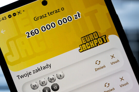 Warsaw, Poland - July 26, 2026: Eurojackpot lottery app displayed on smartphone screen showing 260 million zloty jackpot prize with ticket numbers selected
