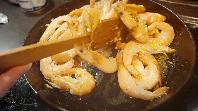 Frying Tiger Prawns In Hot Pan. Cooking Garlic Butter Shrimps. Seafood Recipe Preparation 
