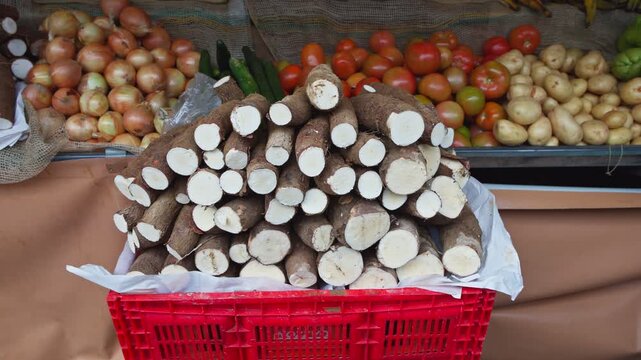 cassava and vegetables at an open-air market 4k