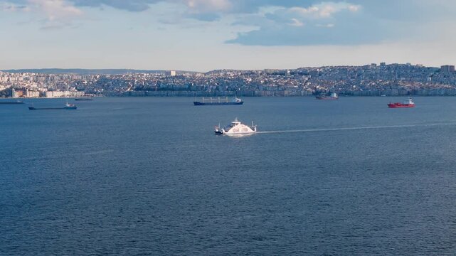 Urban ferry route across calm sea. Wide aerial shot of daily passenger transportation