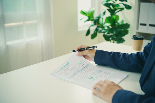Supply chain report review with business professional analysing logistics data to monitor inventory assess performance reduce disruption improve planning and support operational resilience.