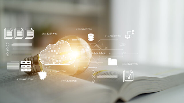 A captivating representation of cloud technology featuring a light bulb and book. The image symbolizes innovation and knowledge integration in a modern work environment. Cyphers