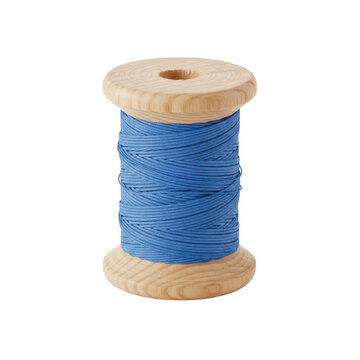 Blue patterned spool of thread on wooden bobbin