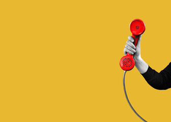 A woman's hand holds a red landline telephone. with copy space for individual text. Flat design art.