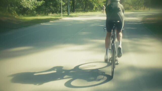 Cyclist Riding Road Bicycle On Asphalt Route. Active Training Endurance 