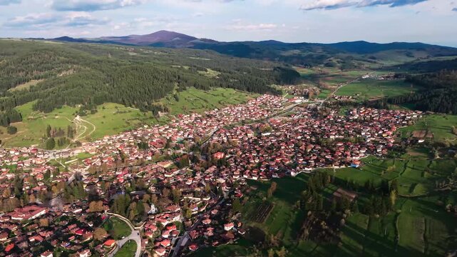 Aerial panoramic view of Koprivshtitsa historic town surrounded by the Sredna Gora mountains in Bulgaria