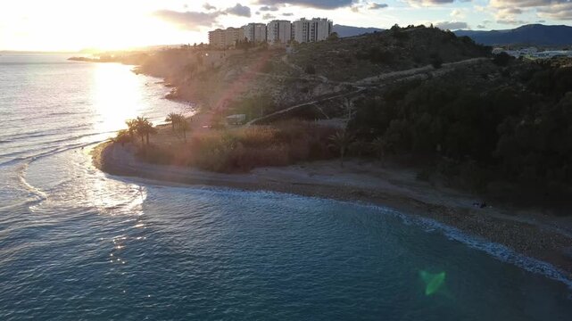 Aerial view of Playa del Torres beach and Mediterranean sea coastline in Villajoyosa, Alicante, Spain.