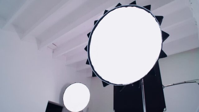 Bright round LED lamp illuminating the film set