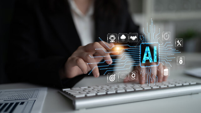 Professional businesswoman interacting with digital artificial intelligence interface while working on a keyboard in a modern office environment Fluxor.