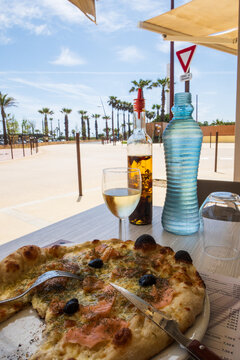 Eating a pizza in Port Barcar&egrave;s, Occitanie region - France