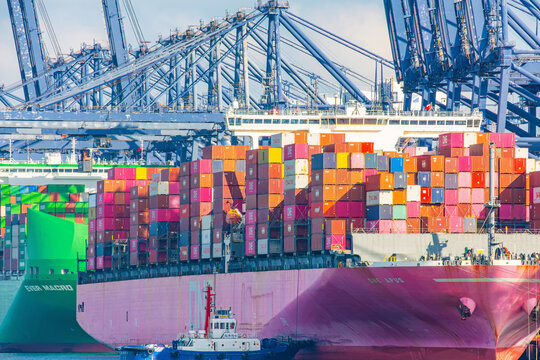 Shenzhen, China - May 22, 2026: Container ships loaded with freight at Shenzhen Port cargo terminal. Maritime transportation, port logistics, commercial shipping and international trade operations