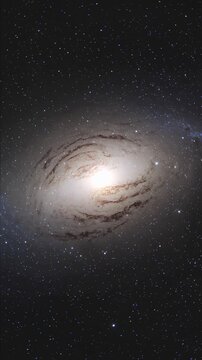 Spectacular spiral galaxy rotating in deep space with its bright core, swirling arms of stars and gas, and surrounding cosmic dust clouds against a starry night sky