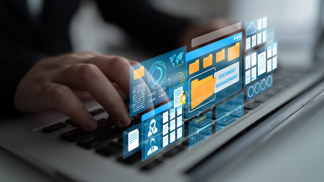 Hands Typing on Laptop with Digital Interface Displaying Document Management and Data Organization Concepts in Modern Workspace Environment. Entropy.