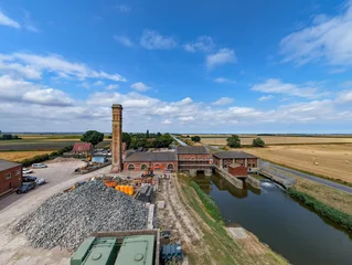 Aerial view of Lade Bank pumping station in Lincolnshire UK pumping station in an open field © MD Media