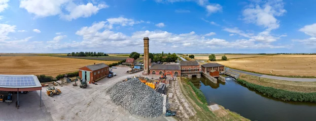 Aerial view of Lade Bank pumping station in Lincolnshire UK pumping station in an open field © MD Media