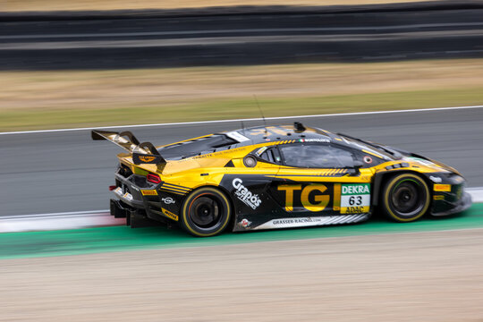 Oschersleben, Germany. 26th July 2026. Mirko Bortolotti powers gold and black number 63 Lamborghini Temerario GT3 across Oschersleben runoff for TGI Team by GRT. 