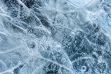 Naklejka premium Ice layers with trapped air bubbles in frozen surface