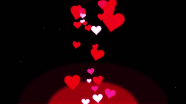 Romantic red heart particles floating animation on black background, for valentine&rsquo;s day, and love themes