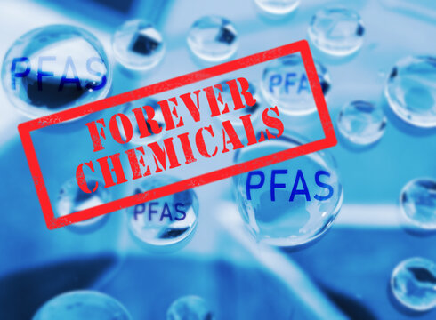 Forever Chemicals stamp text with PFAS water drops -  polyfluoroalkyl contamination concept