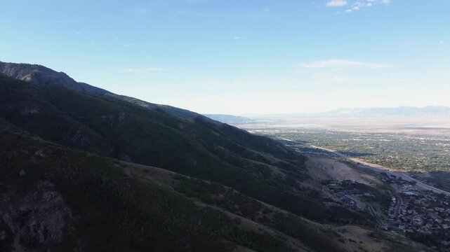 4K Aerial Drone Video Summer Sunrise Over Fernwood Cabin Trail Layton Utah Looking West Across Davis County Valley to Great Salt Lake and Wasatch Mountains