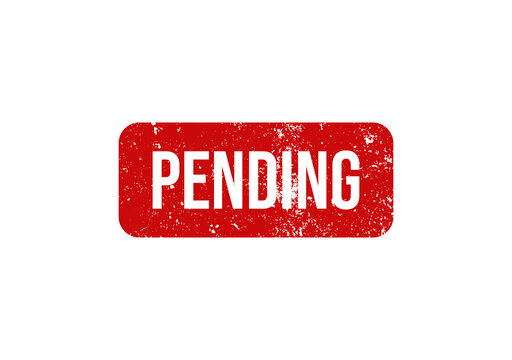 A red rectangular rubber stamp with the word pending written in white text isolated on white background.