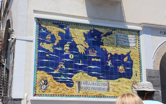 Amalfi, Italy on May 25, 2024. Historical maritime map ceramic tile mural on wall in Amalfi Italy.