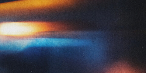 Abstract colorful light streaks on dark background. Dynamic visual art for creative projects. © Nasrin