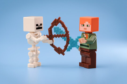 Minecraft Skeleton holding a brown Bow faces Minecraft Alex with a Diamond Sword as their weapons meet between the two figures on a blue background on Jul 25, 2026 in Jakarta, Indonesia