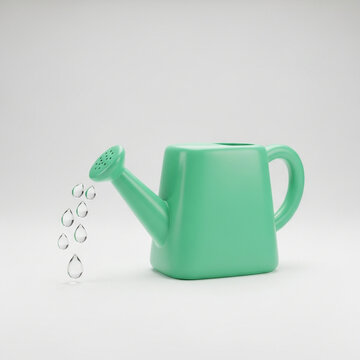 Green watering can with water drops
