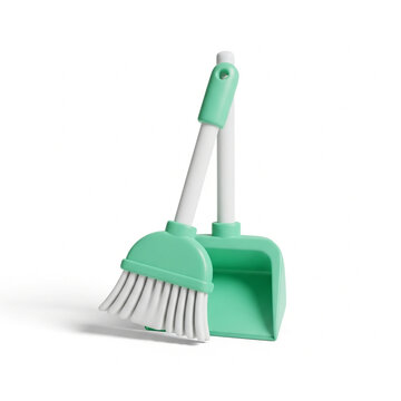 Green dustpan and brush set on white background