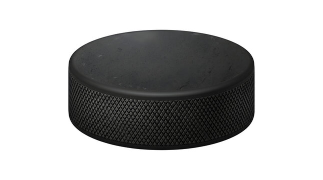 Professional black hockey puck, vulcanized rubber ice hockey puck with textured grip, classic sports equipment isolated on white background