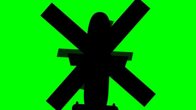 Silhouette of a windmill against a vibrant green screen background.