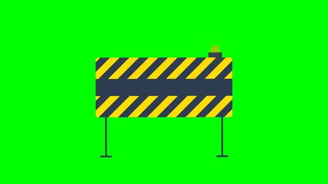 Construction barrier with flashing light on green screen background.