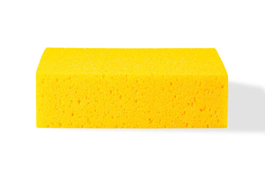 Yellow cleaning sponge shown from a side perspective.  for household chores, car washing, dishwashing, and general hygiene product marketing. on white background.