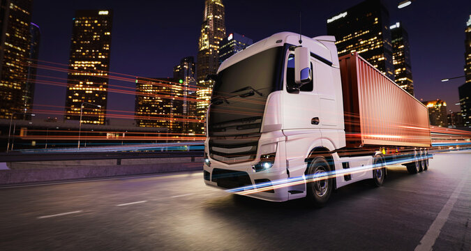 Cargo Truck Driving Through Modern City at Night