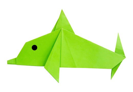 green origami dolphin on white background isolated
