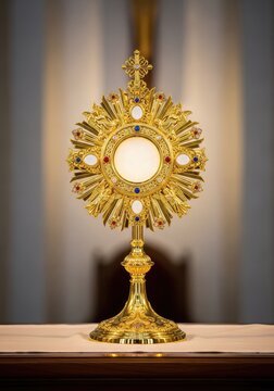 A detailed golden monstrance holds a white consecrated host, displayed on an altar with soft lighting highlighting the ornate metalwork, gleaming, spiritual, devotion