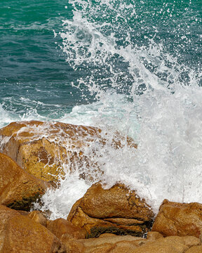 waves crashing on rocks