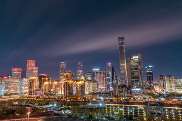 Obraz premium The dazzling cityscape and modern financial skyline of Beijing's CBD.
