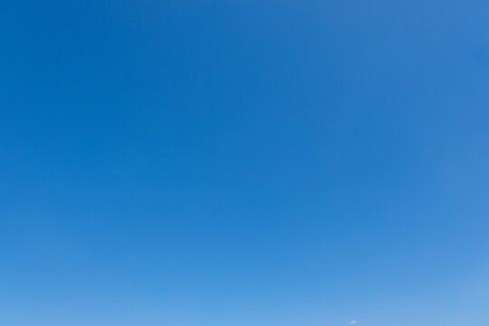 clear blue sky background,clouds with background, Blue sky background with tiny clouds. White fluffy clouds in the blue sky. 