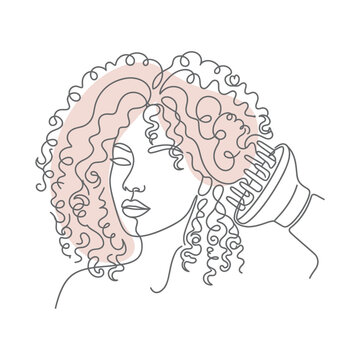 Woman with curly hair using a blow dryer diffuser.