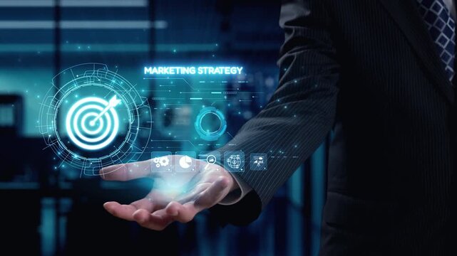 A businessman stands with an outstretched hand, presenting a digital interface showcasing a marketing strategy. The modern office backdrop enhances the futuristic concept. Qubit