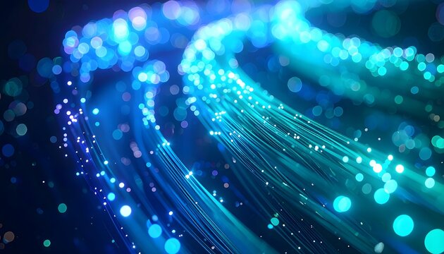 Macro photograph of glowing fiber optic cables (whirlpool of blue and green light)